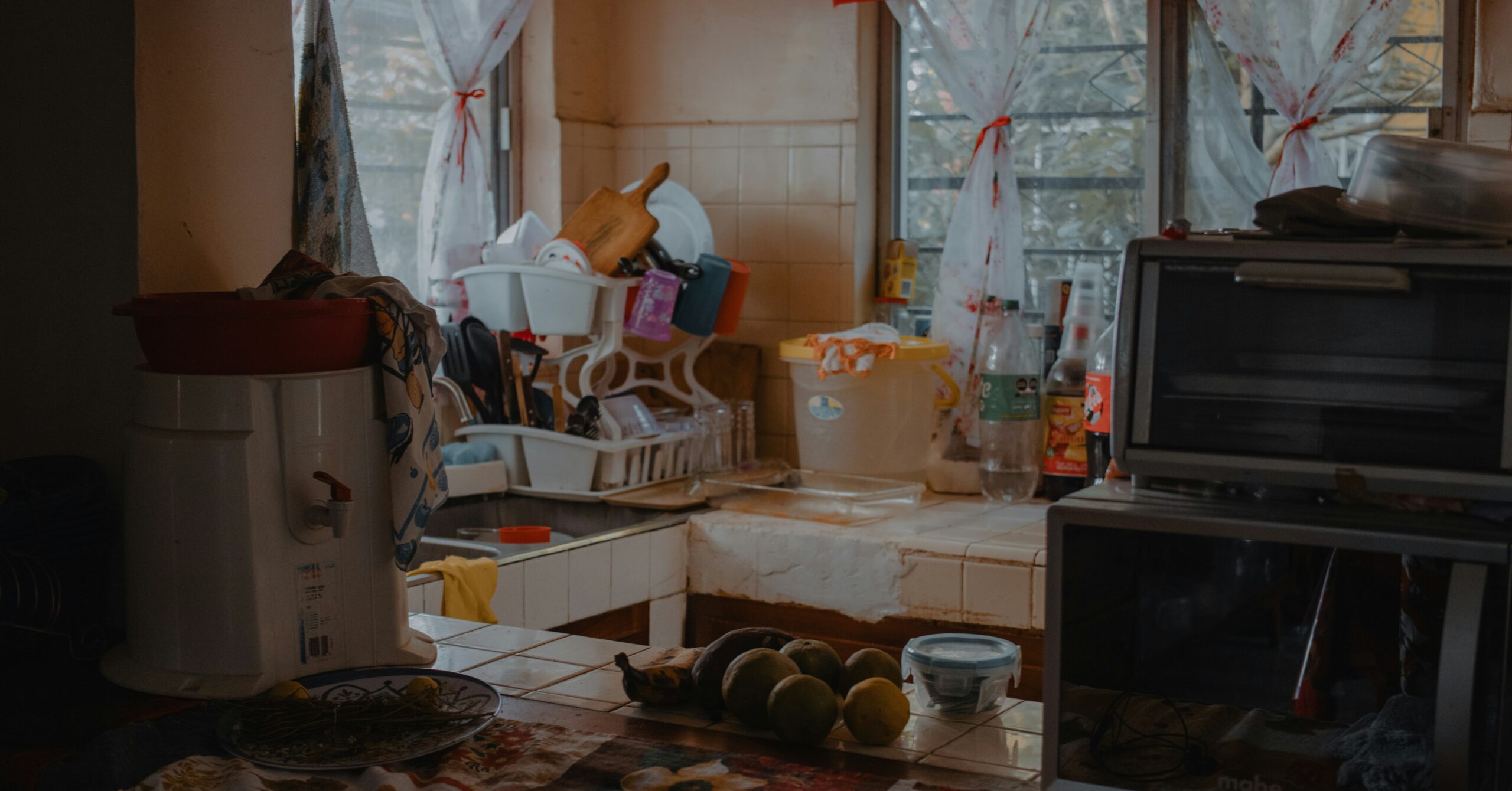 A messy kitchen ilustrating recycling myths at home.